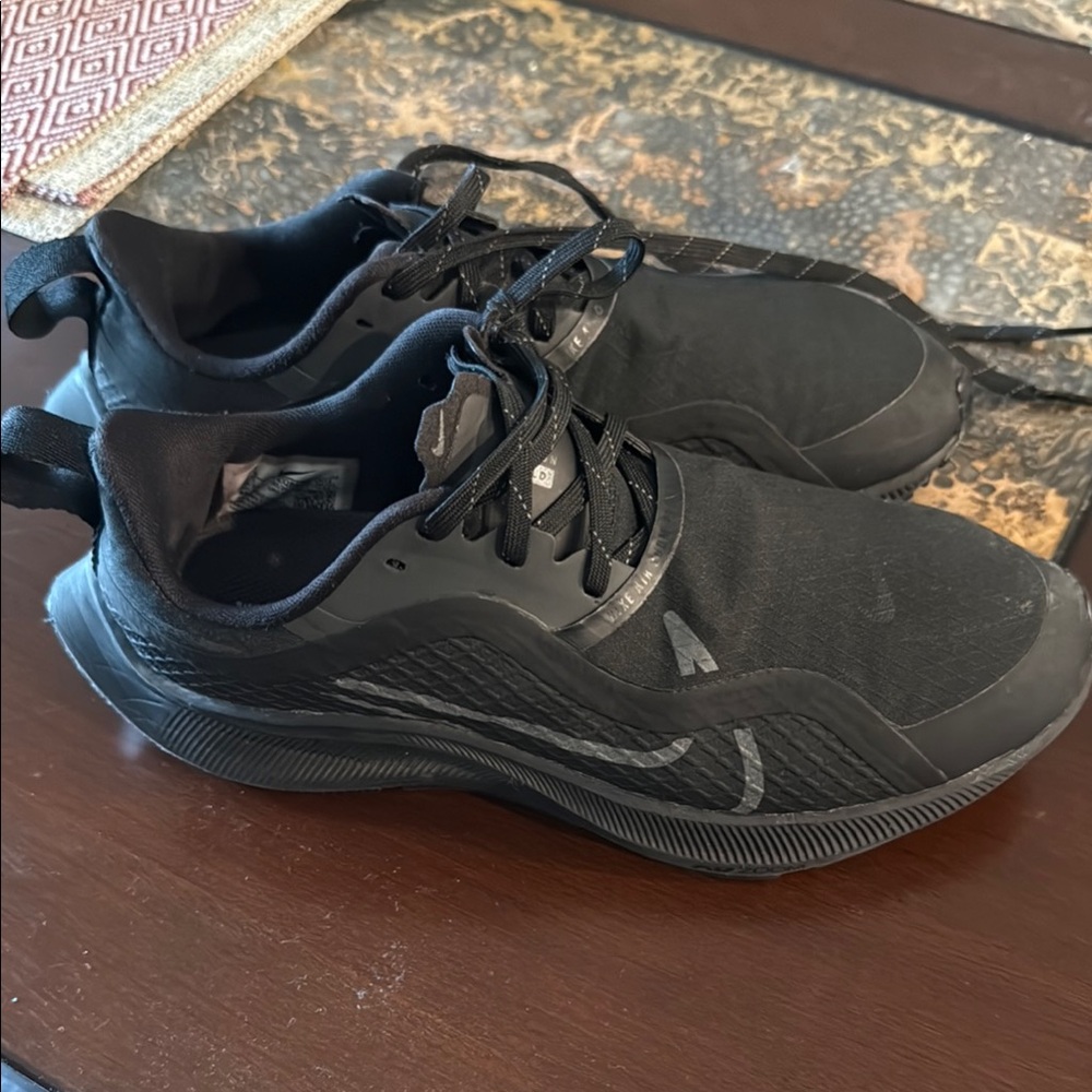 Nike Black Athletic Shoes with Streamlined Design